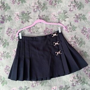 Black Pleated Mini Skirt with Buckle Accents